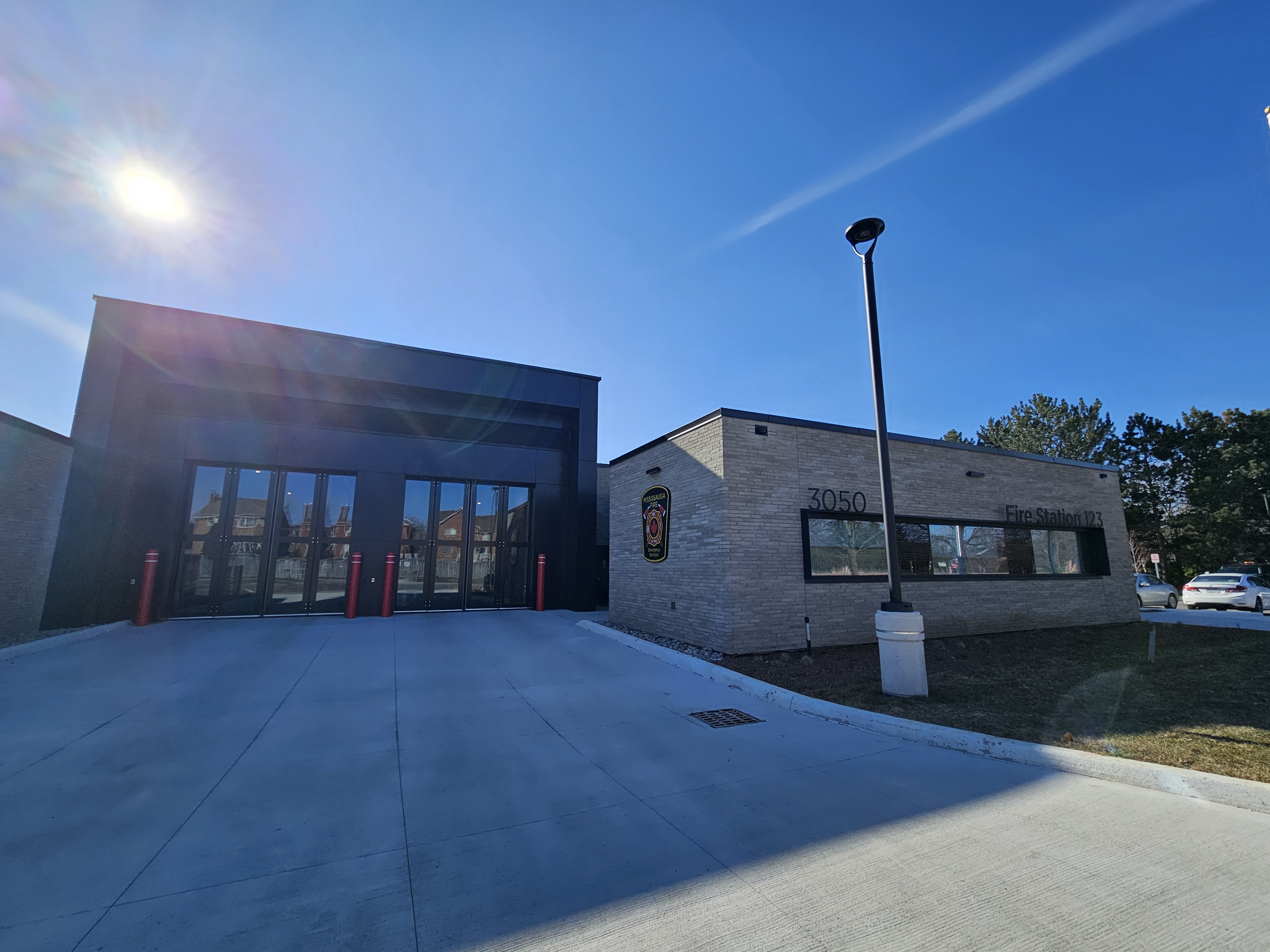 Fire station with blue sky behind.